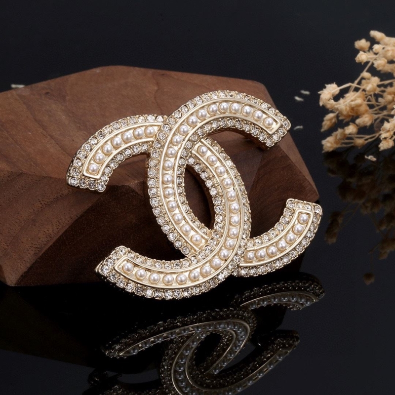 Ch**el brooches